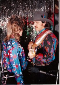 Rand & Sue in front of the famous sparkling curtains